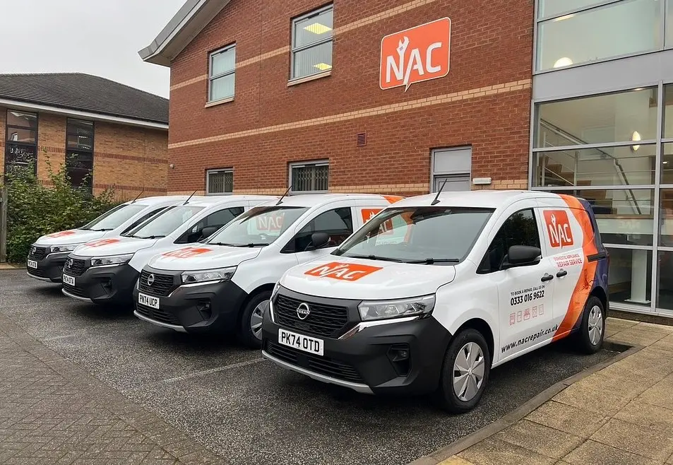 NAC's branded engineer van fleet outside the national head office